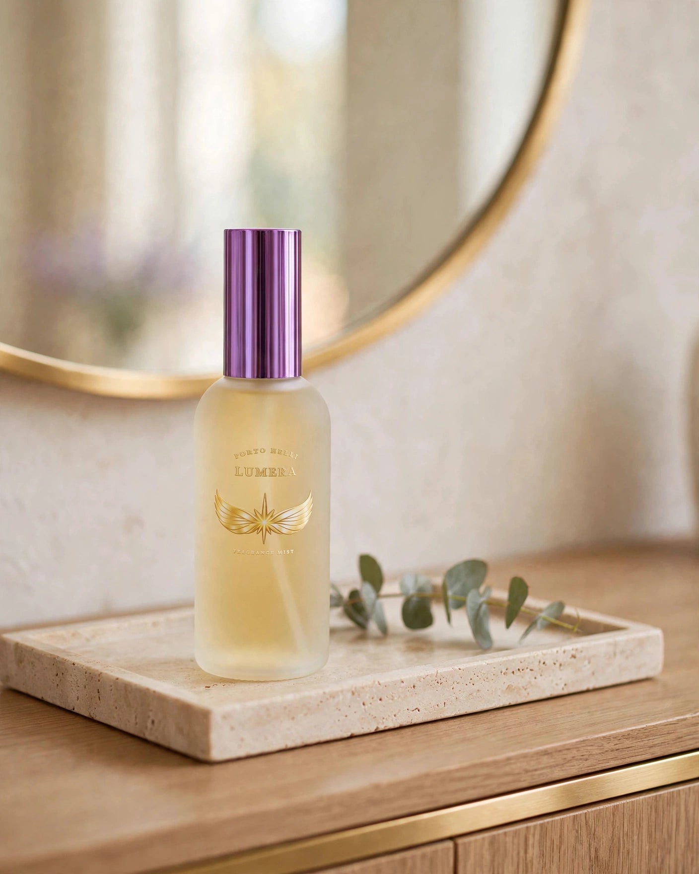 LUMERA Fragrance Mist by Porto Helli displayed on a travertine tray in a refined entryway